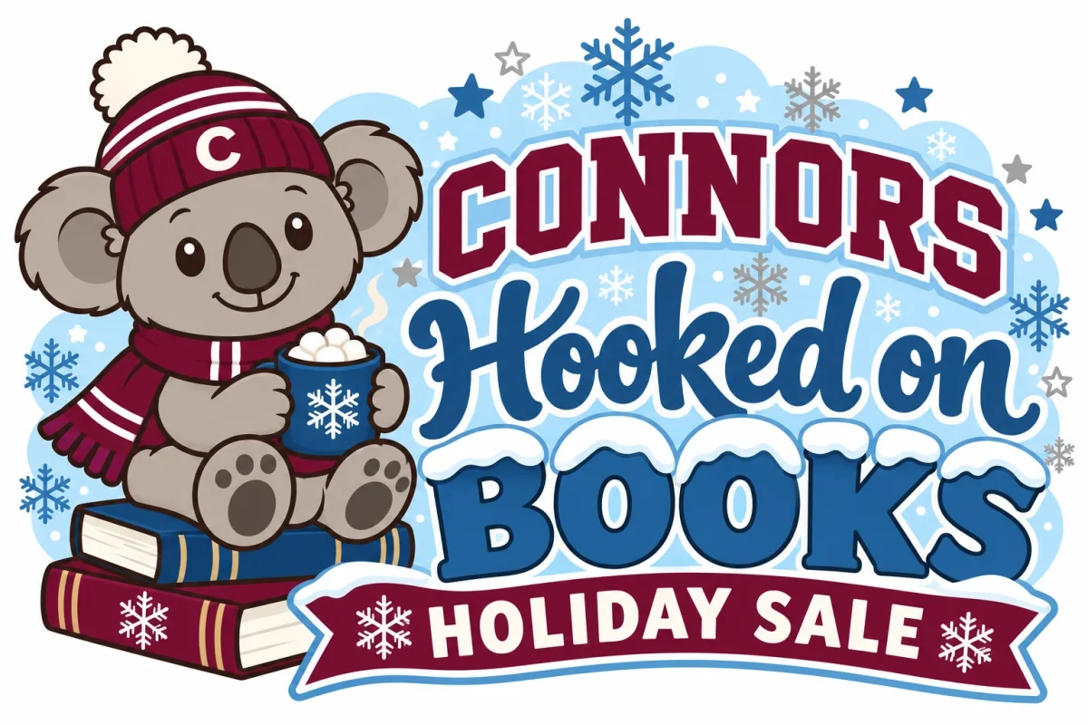 Coco Koala in a maroon Connors hat and scarf, sitting on a stack of books with hot cocoa, beside the words Connors Hooked on Books Holiday Sale
