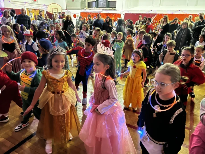 Connors kids dancing in costumes at the Halloween Dance