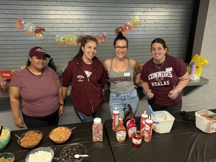 Connors PTO volunteers serving at an event